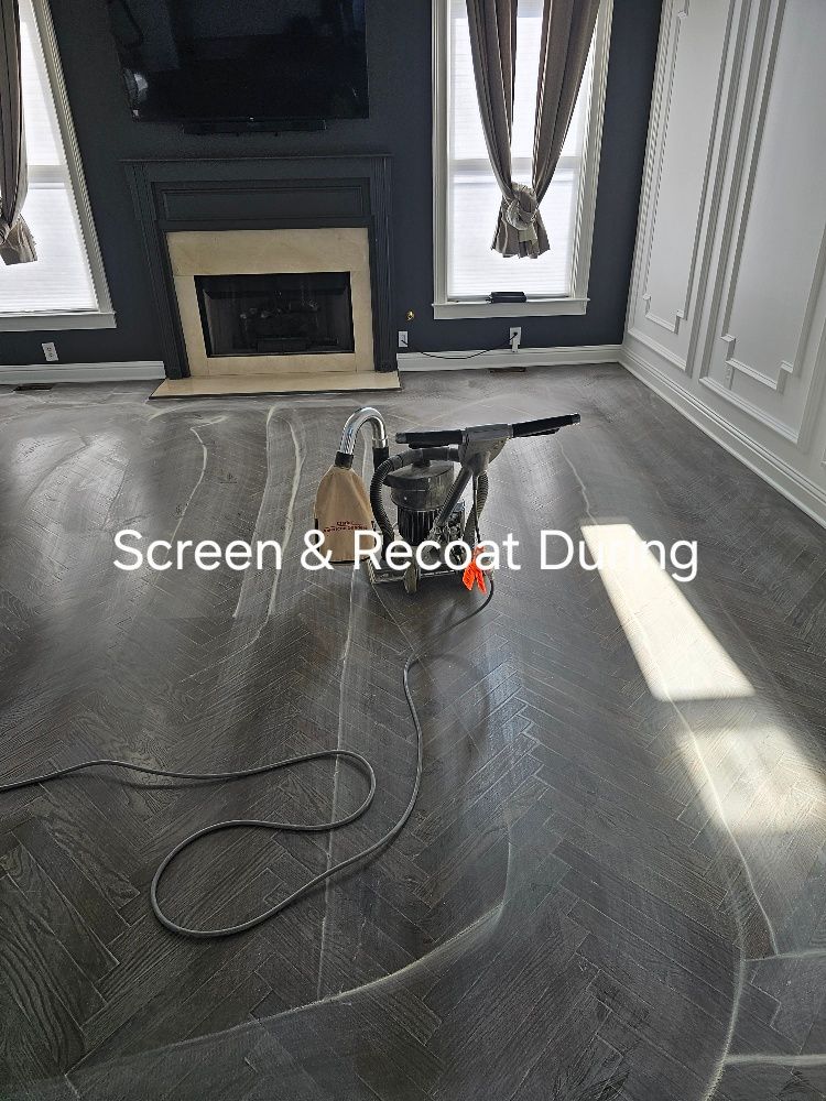 A machine is sitting on the floor in a living room next to a fireplace.