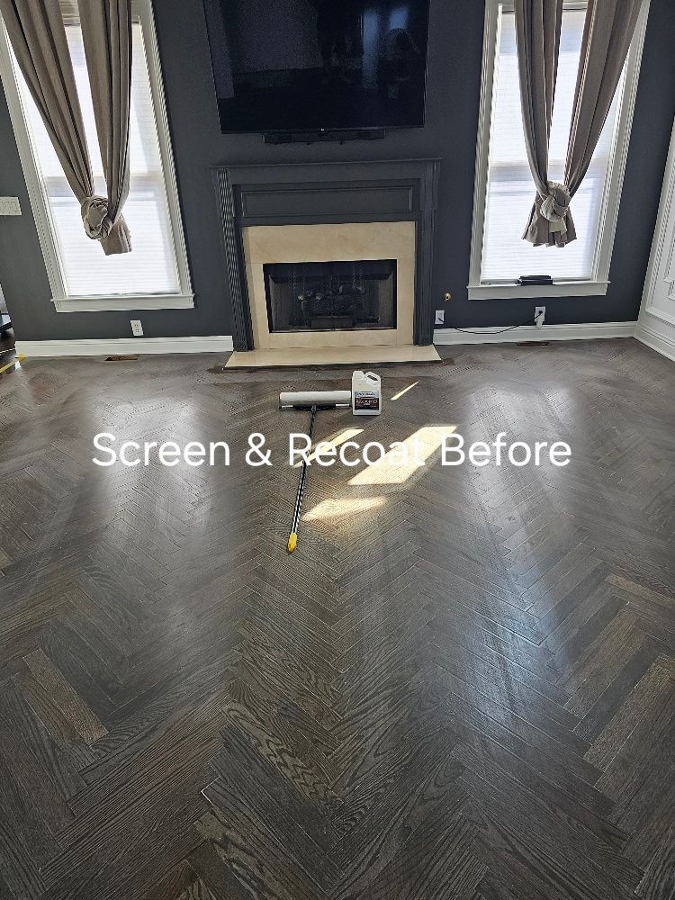 A living room with a fireplace and a flat screen tv.