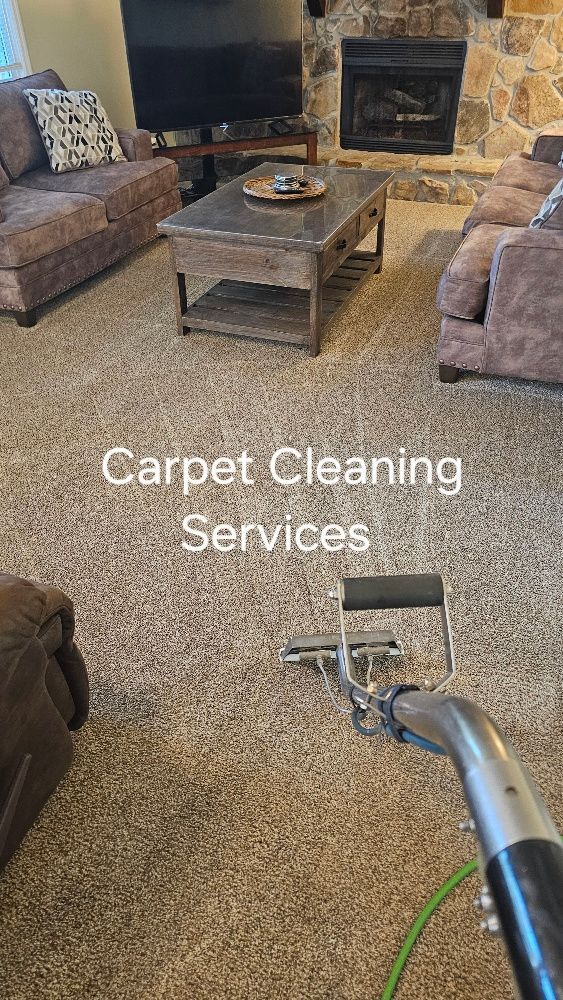A living room filled with furniture and a fireplace.