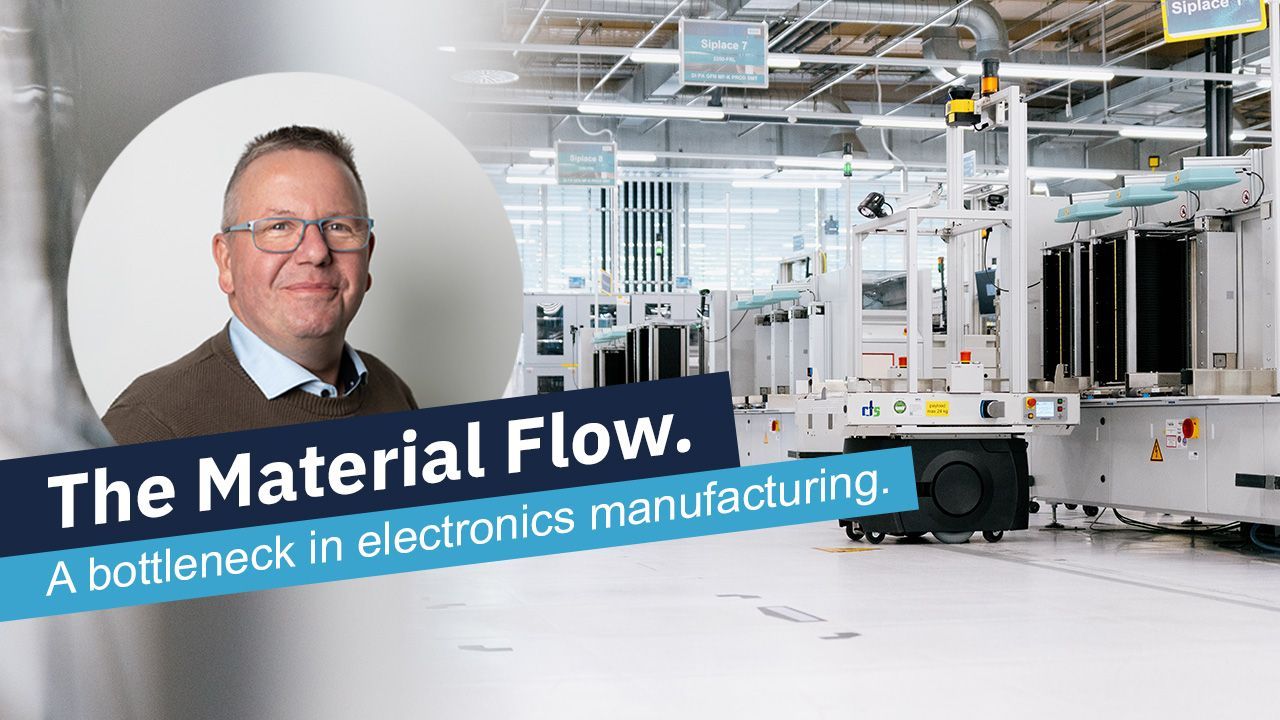 A man smiles next to a factory floor with machinery, under the text 