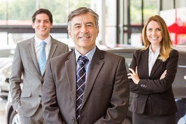 Dealer License — Group of Smiling Business Team Standing Together in Delran, NJ