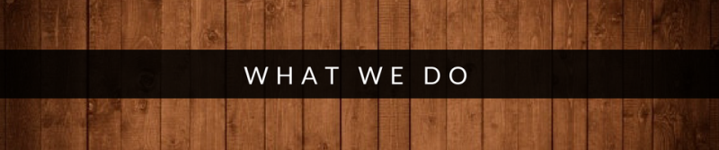 Wood-paneled background with a black center band reading “WHAT WE DO”