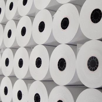 A bunch of rolls of toilet paper are stacked on top of each other.