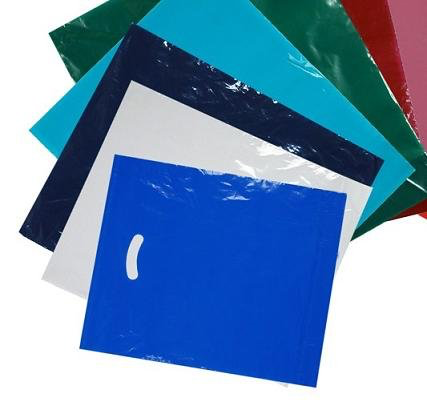 A blue plastic bag with a hole in the middle