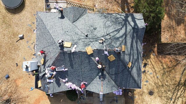 Workers on the roof - Woodstock, GA | MTak Roofing Systems