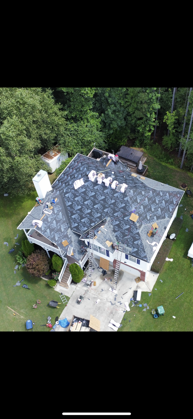 Aerial view of a house being remodeled - Woodstock, GA | MTak Roofing Systems