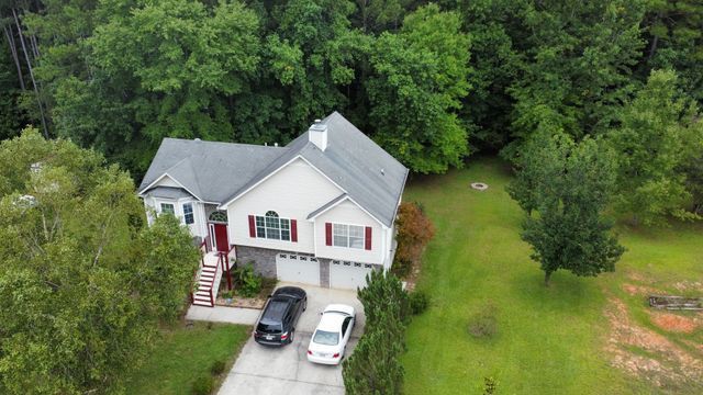 House with two car - Woodstock, GA | MTak Roofing Systems