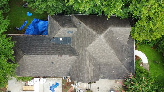 Finalizing the newly installed roof - Woodstock, GA | MTak Roofing Systems