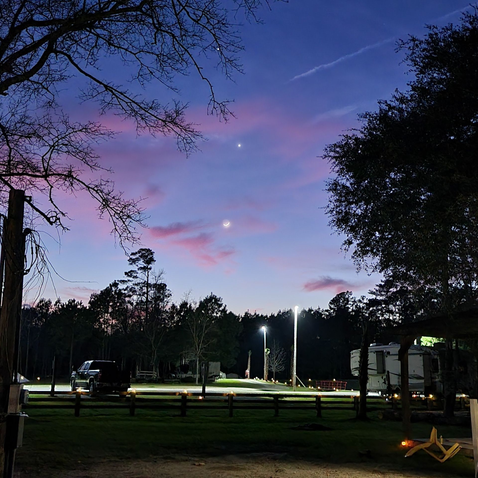 The moon is visible in the night sky
