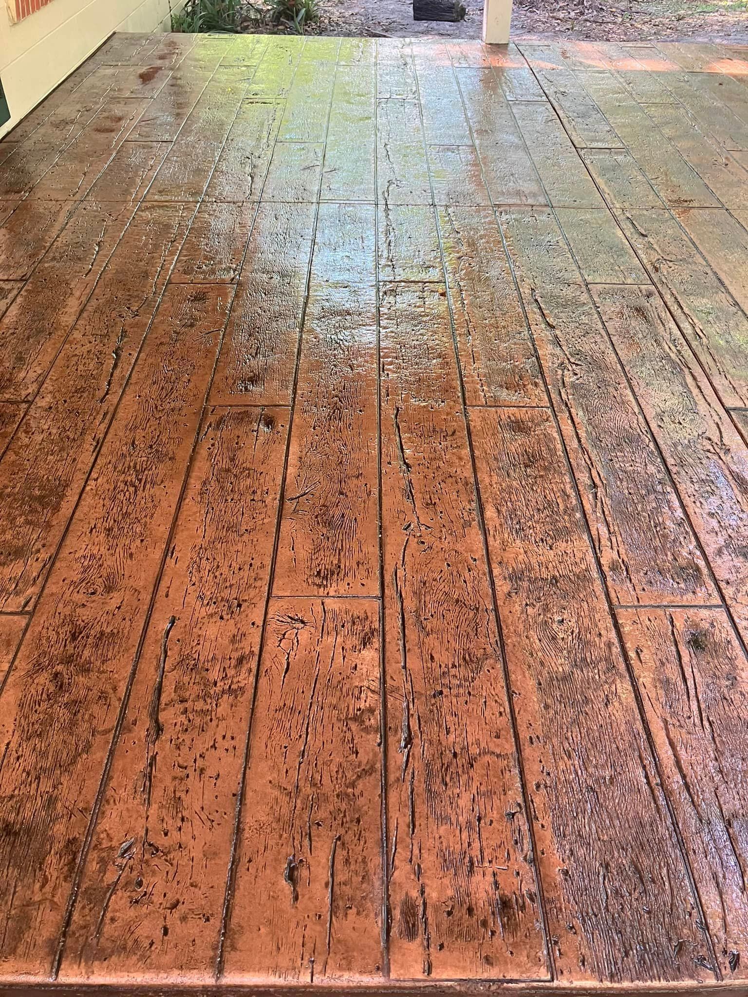 A close up of a concrete floor that looks like wood.