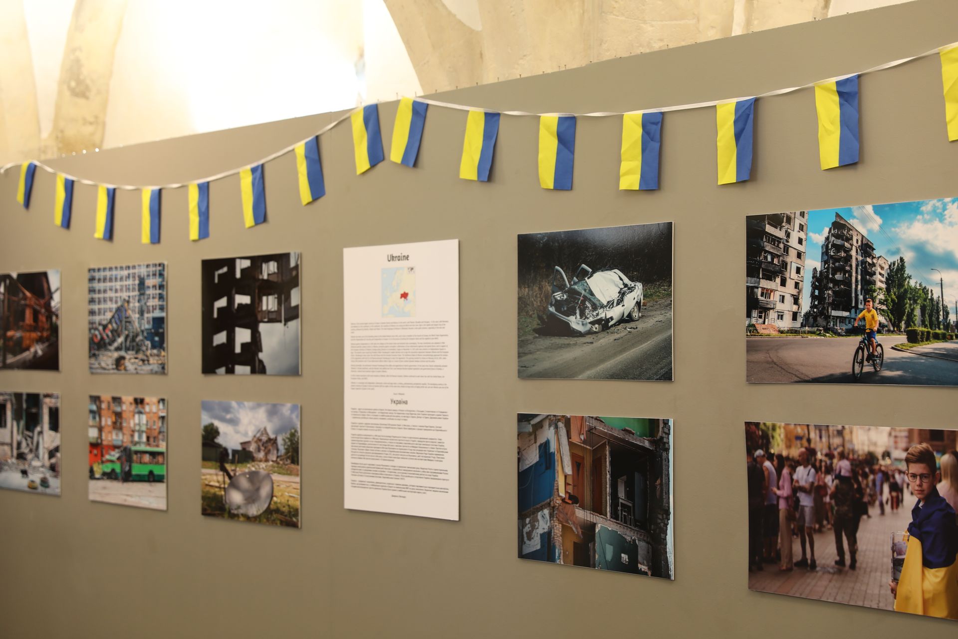 A wall with a bunch of pictures on it