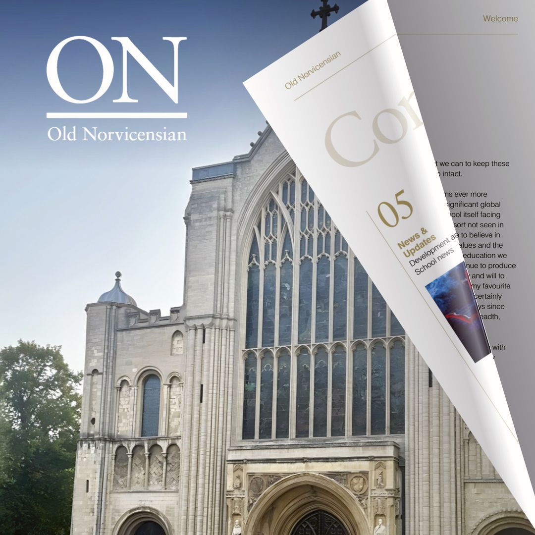 An old norvicensian magazine with a picture of a church on the cover