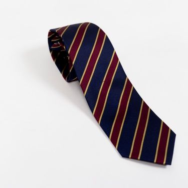 A blue and red striped tie on a white background