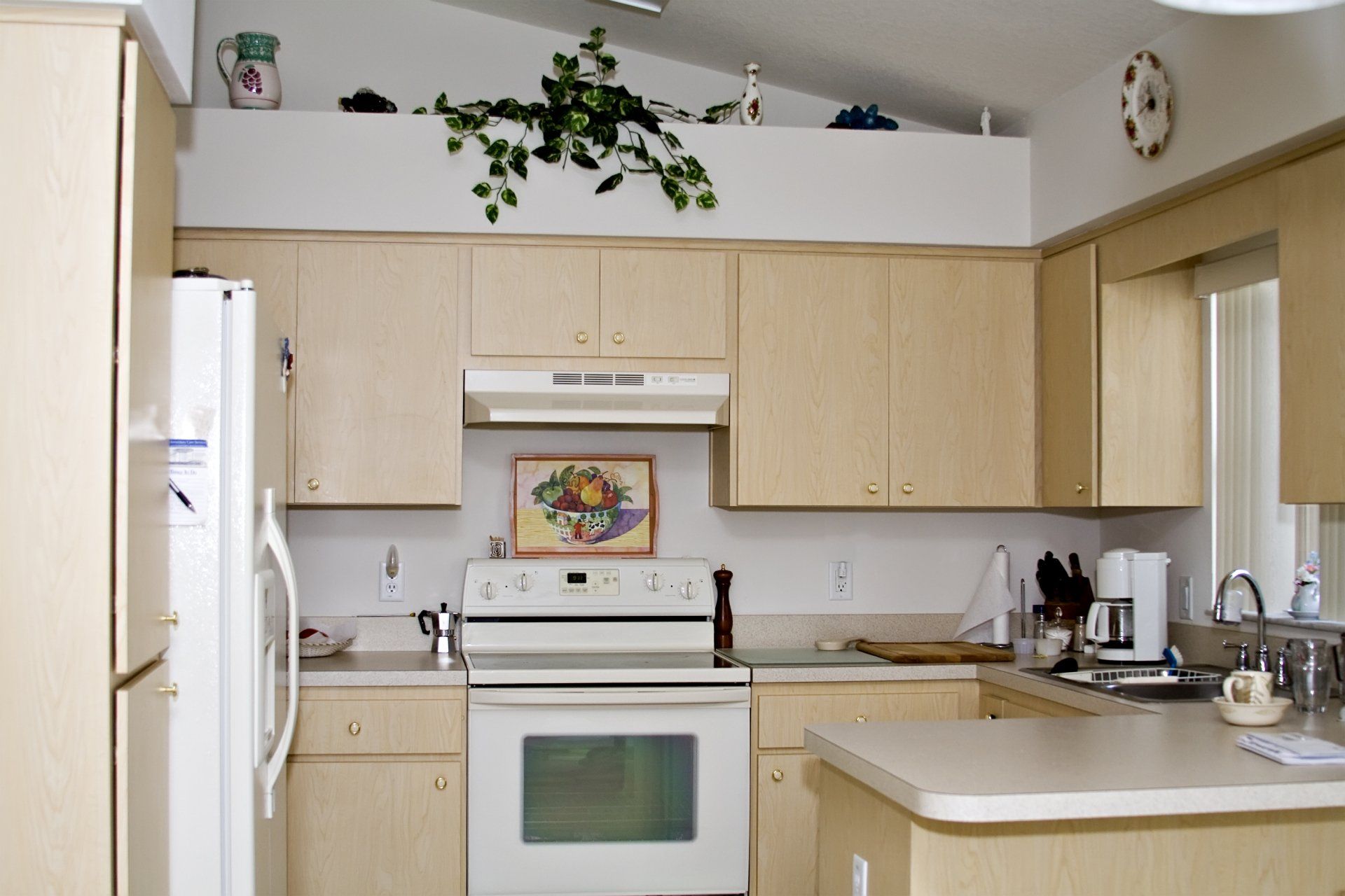 cramped kitchen space before remodeling by Top Gunn Kitchen Design
