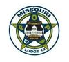 Missouri Lodge 14 circular emblem with eagle, stars, and blue-green border