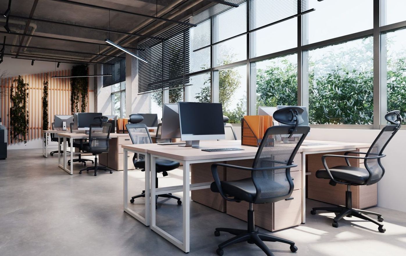An empty office with a lot of windows and desks and chairs.