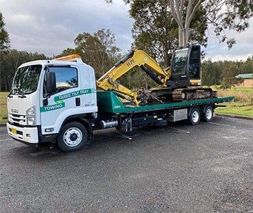 Truck Loaded With Mini Excavator — Emergency Towing in Taree, NSW