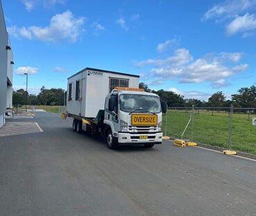 Truck Loaded With Cargo Container — Emergency Towing in Taree, NSW