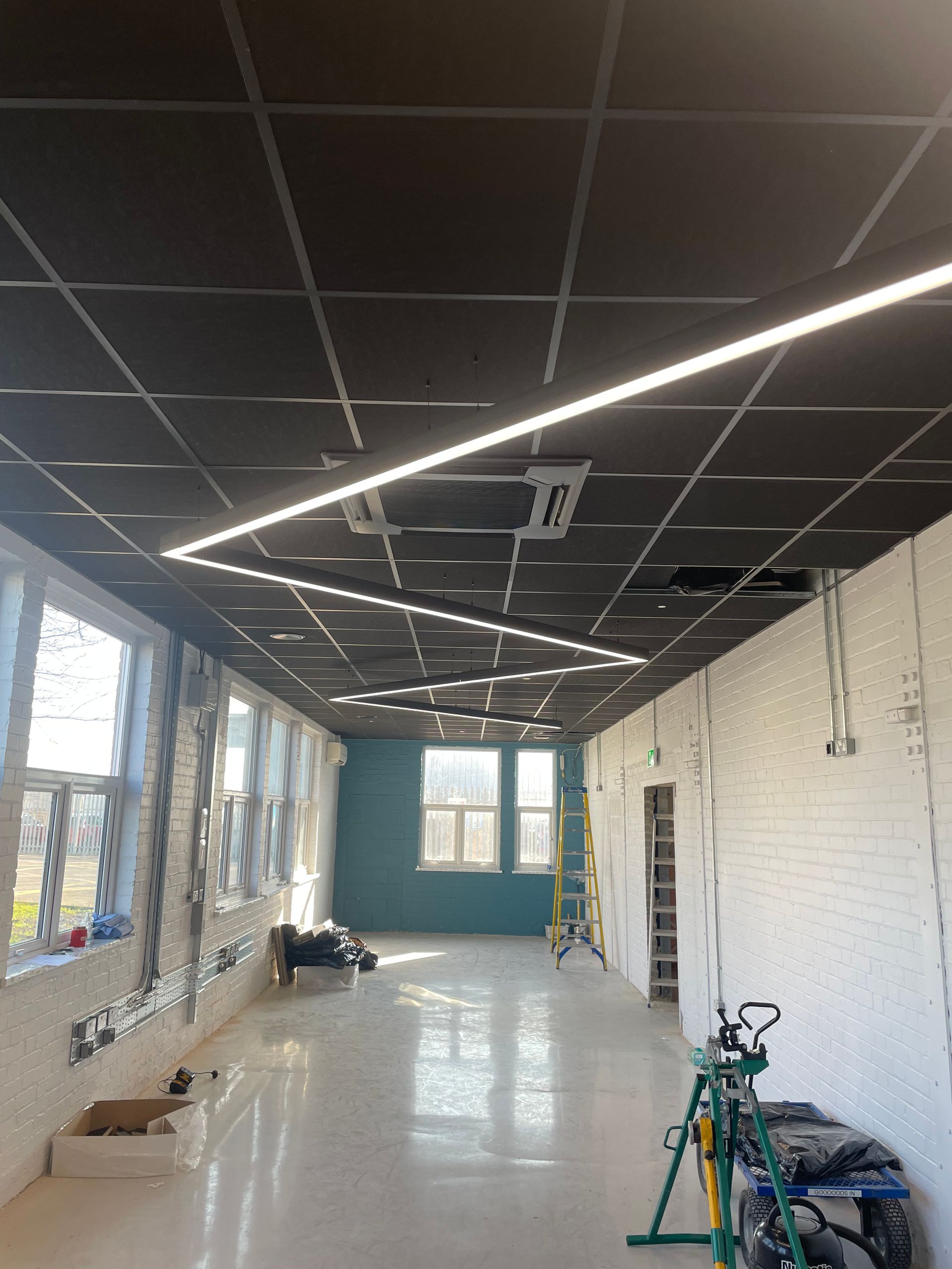 Elevating Office Design: Industrial-Style Ceilings for Aerospace Firm
