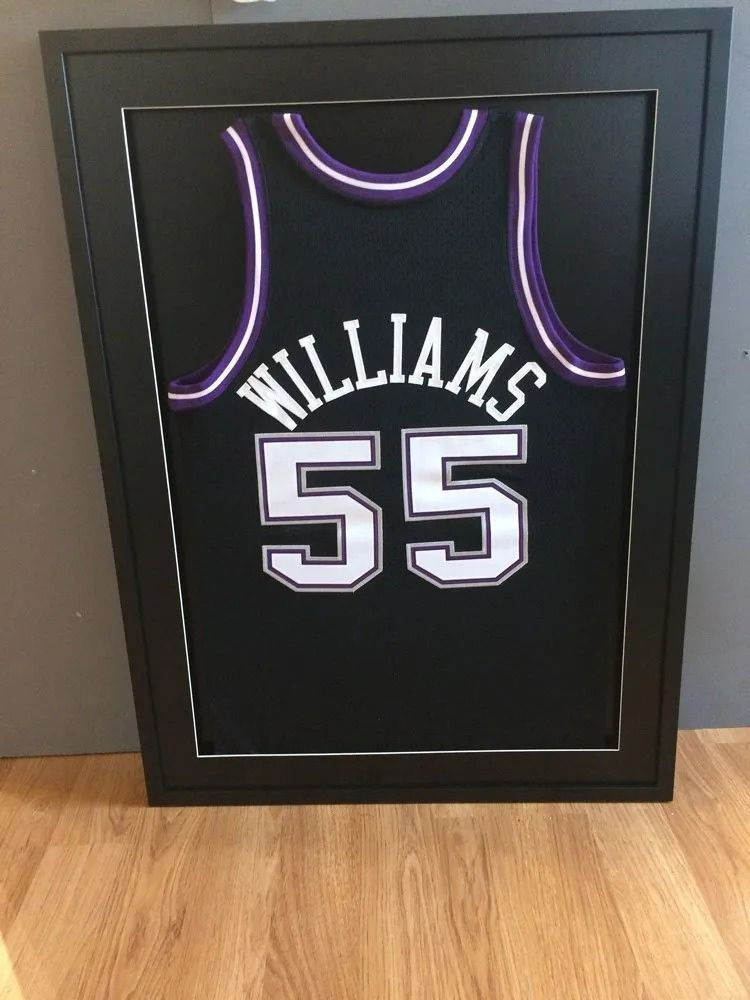 A Framed Jersey with The Number 55 on It — The Framer In Taree, NSW