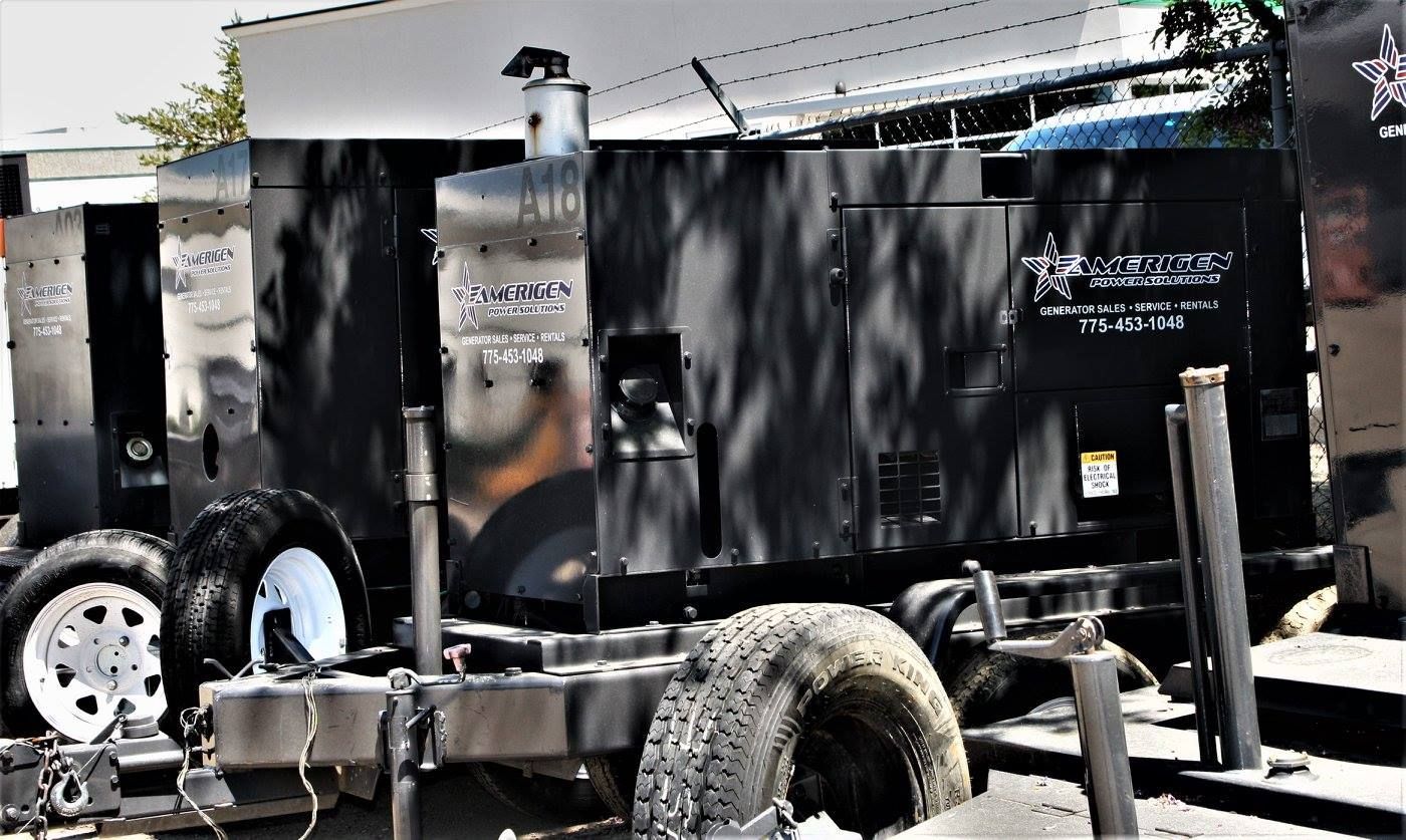 A black truck with a picture of a man on the side of it