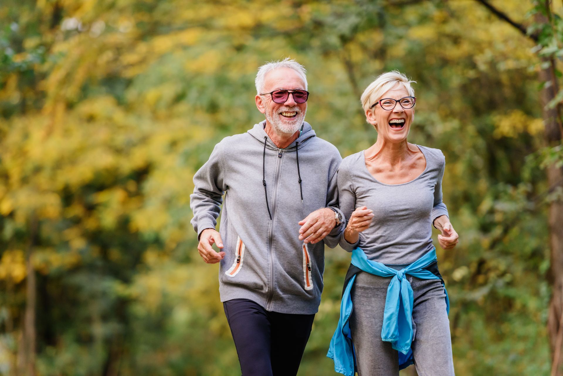 Senior couple running