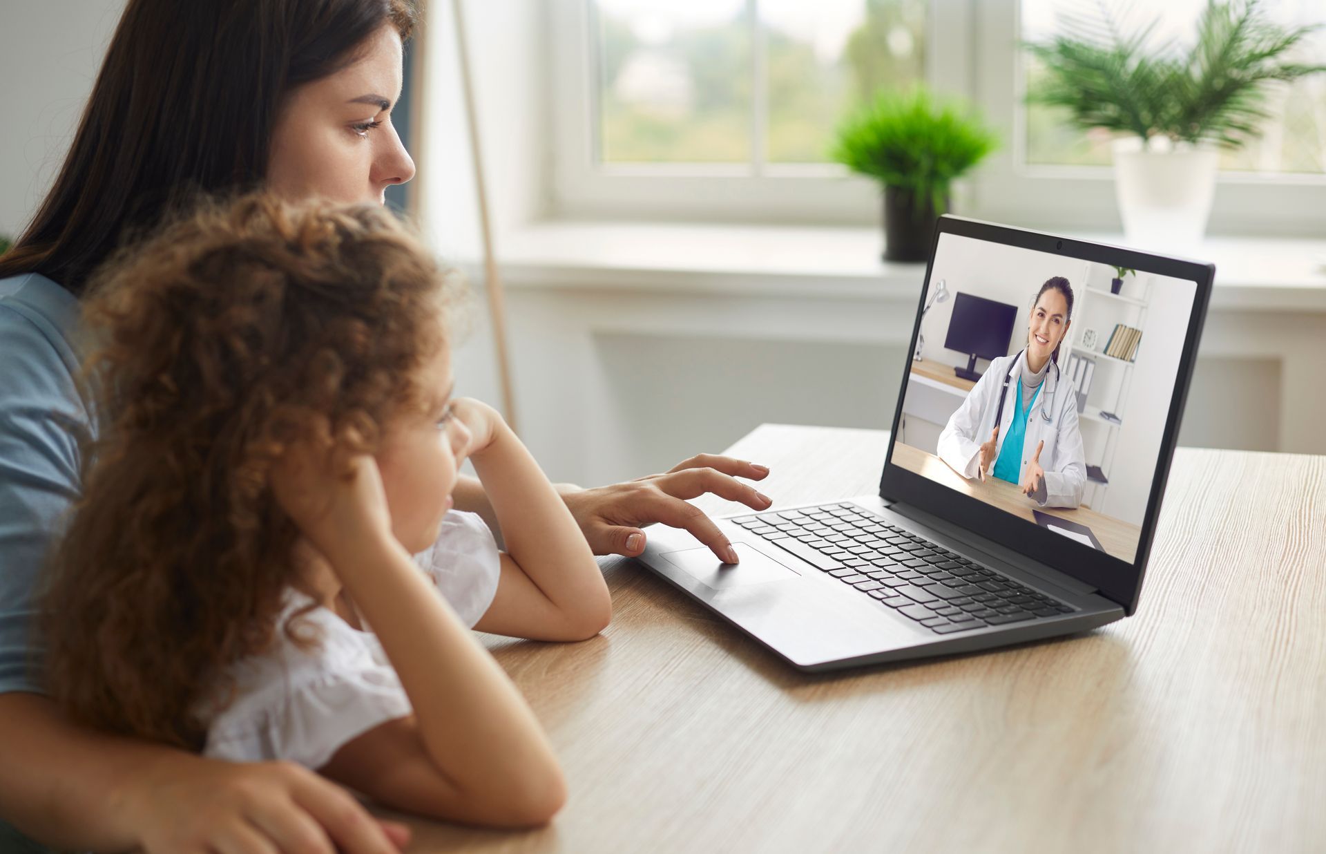 Mom and daughter having a televisit