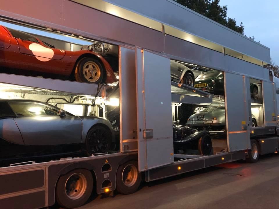 Closed car transporter containing prestige and classic cars.