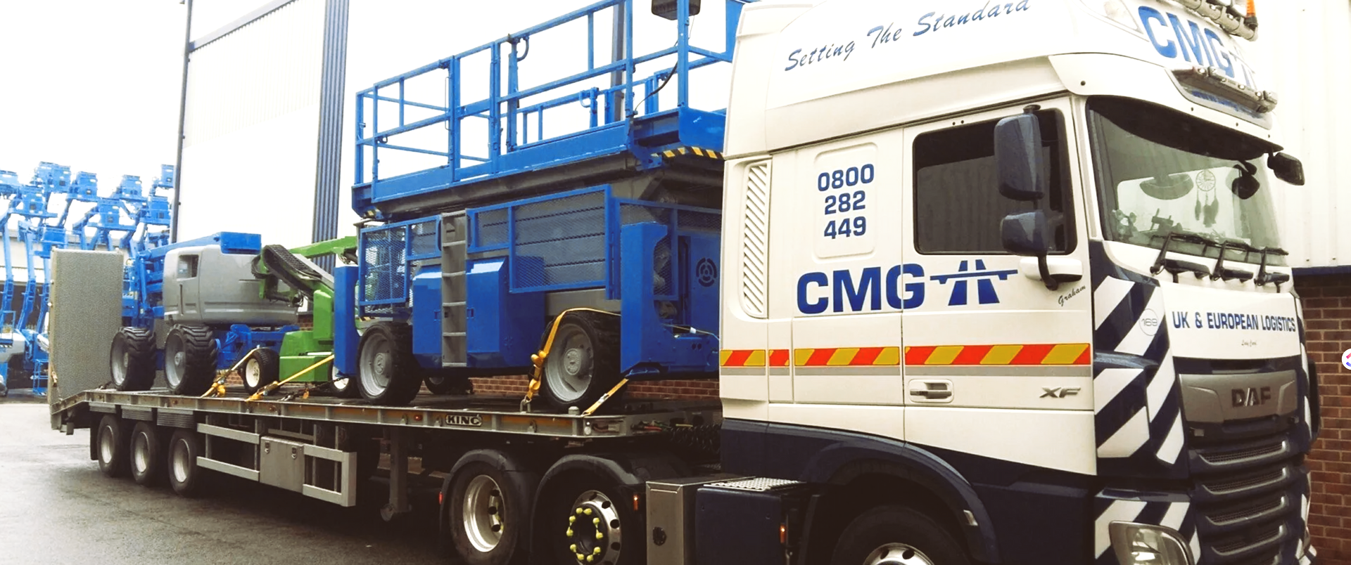 a large truck with the word cmg on the side
