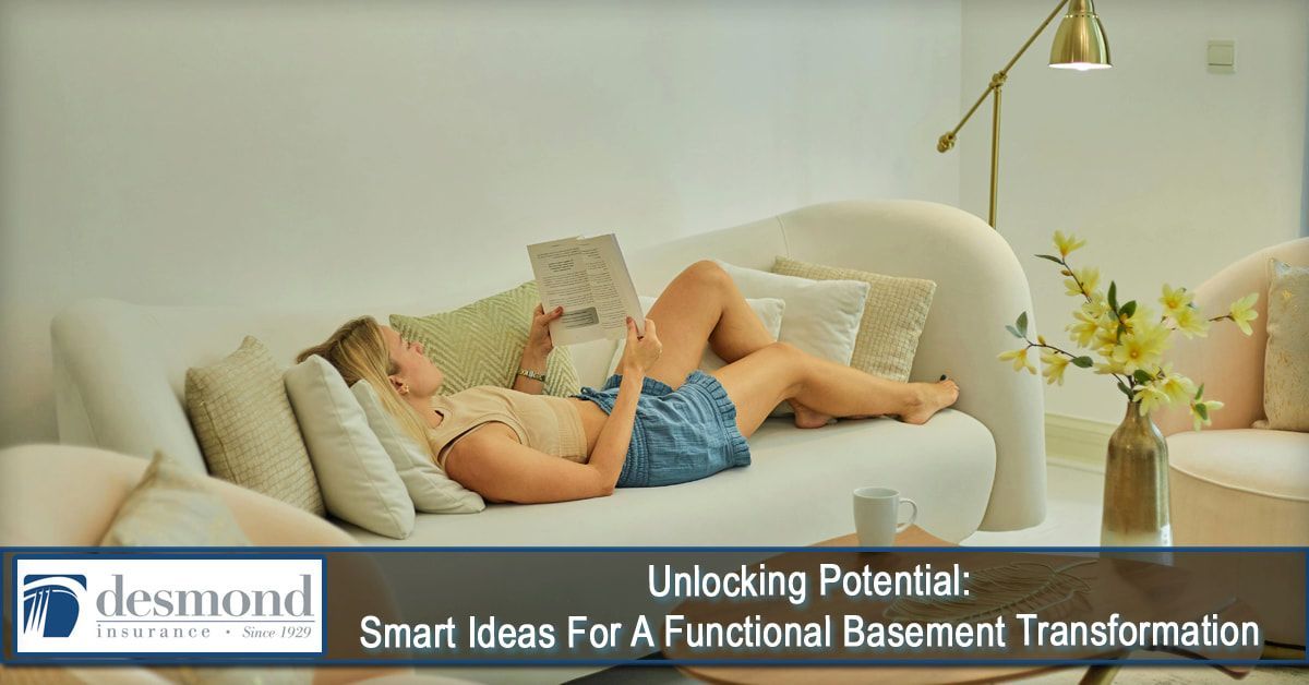 Woman relaxing on a couch, reading. Light-filled room with flowers, lamp, and coffee table. 