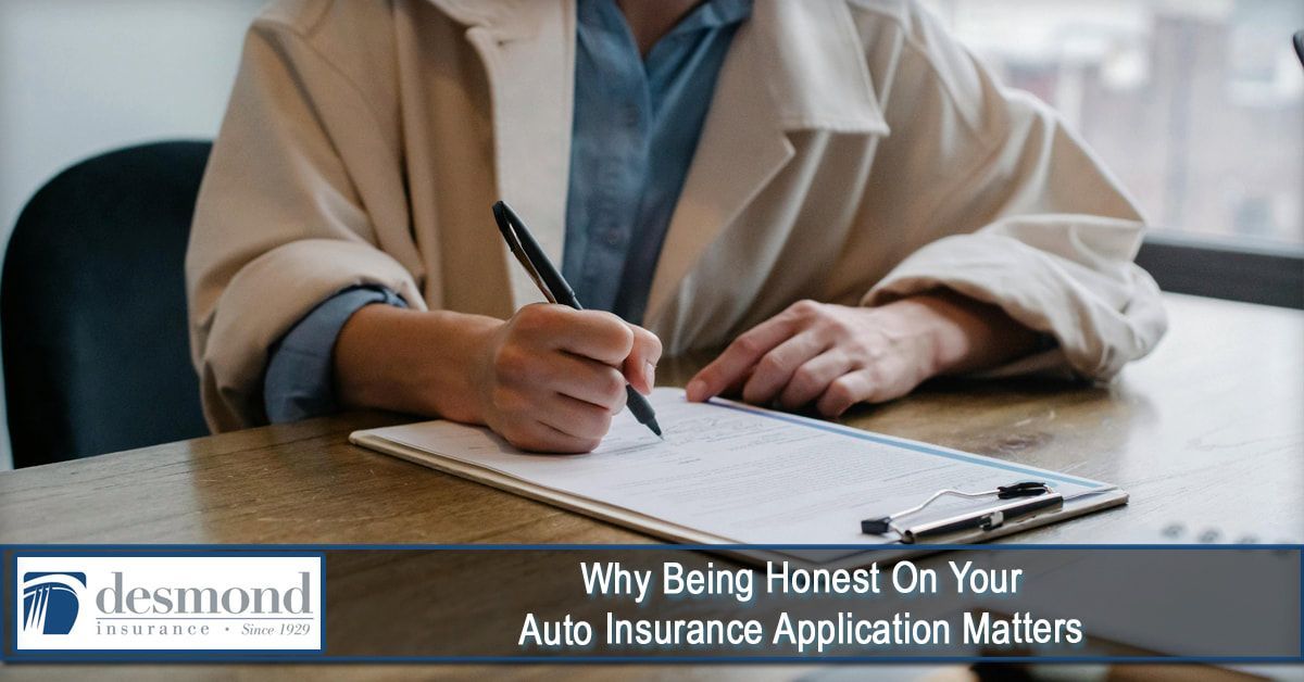 Person filling out a document on a clipboard. Text: 