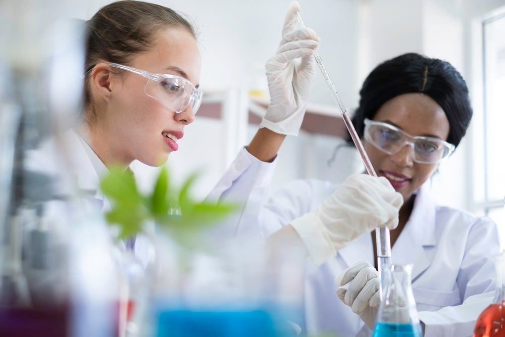 Two female scientists are working in a laboratory.