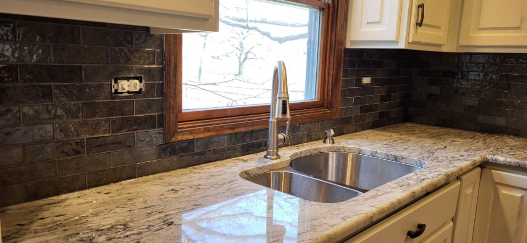 Marble kitchen countertop next to sink