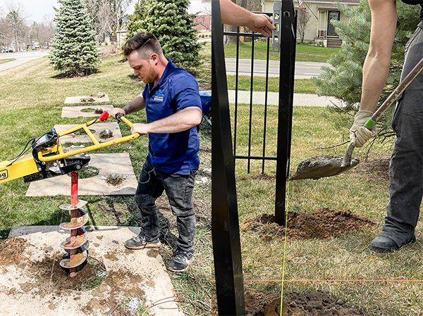 Radiance Employee Working on a Homeowners Yard — Chesterfield, MI — Radiance Aluminum Fence, Inc.
