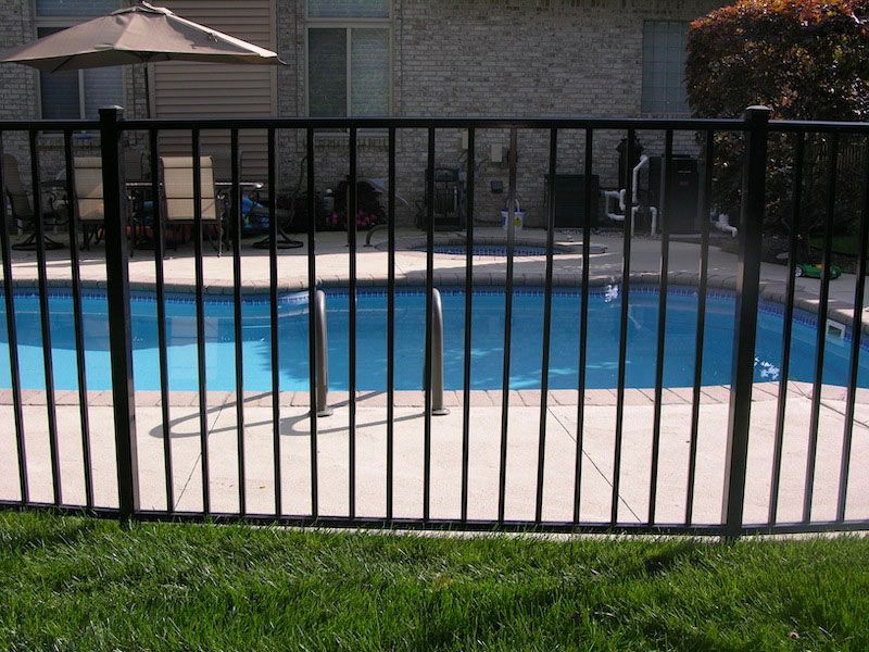 Simple Pool with Fence — Chesterfield, MI — Radiance Aluminum Fence, Inc.