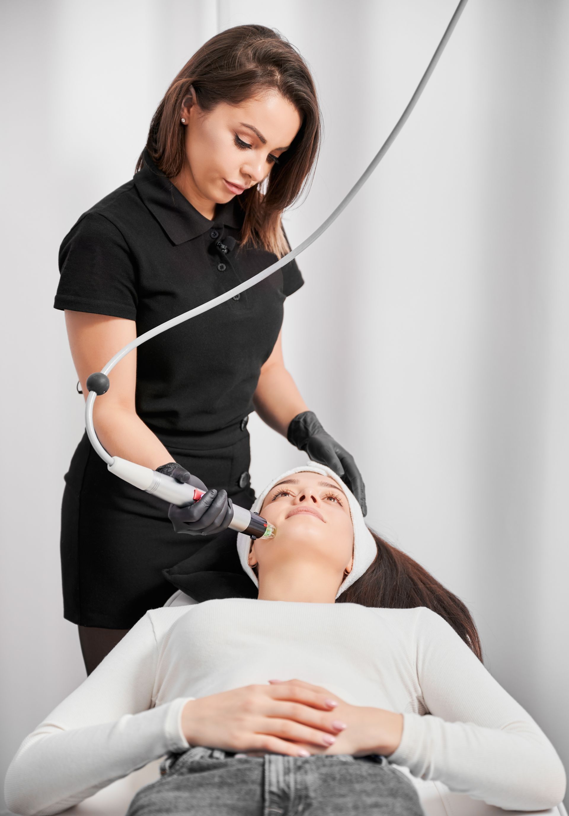woman receives rosacea treatment