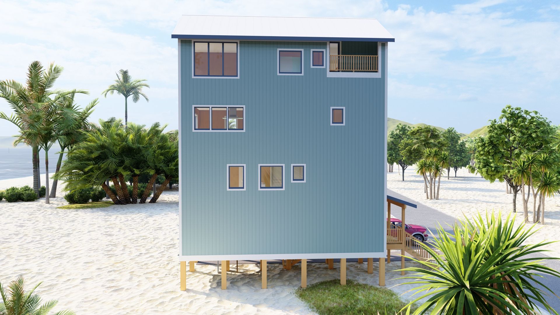 Blue metal-clad beach house on stilts with various sized windows, on a sandy beach.