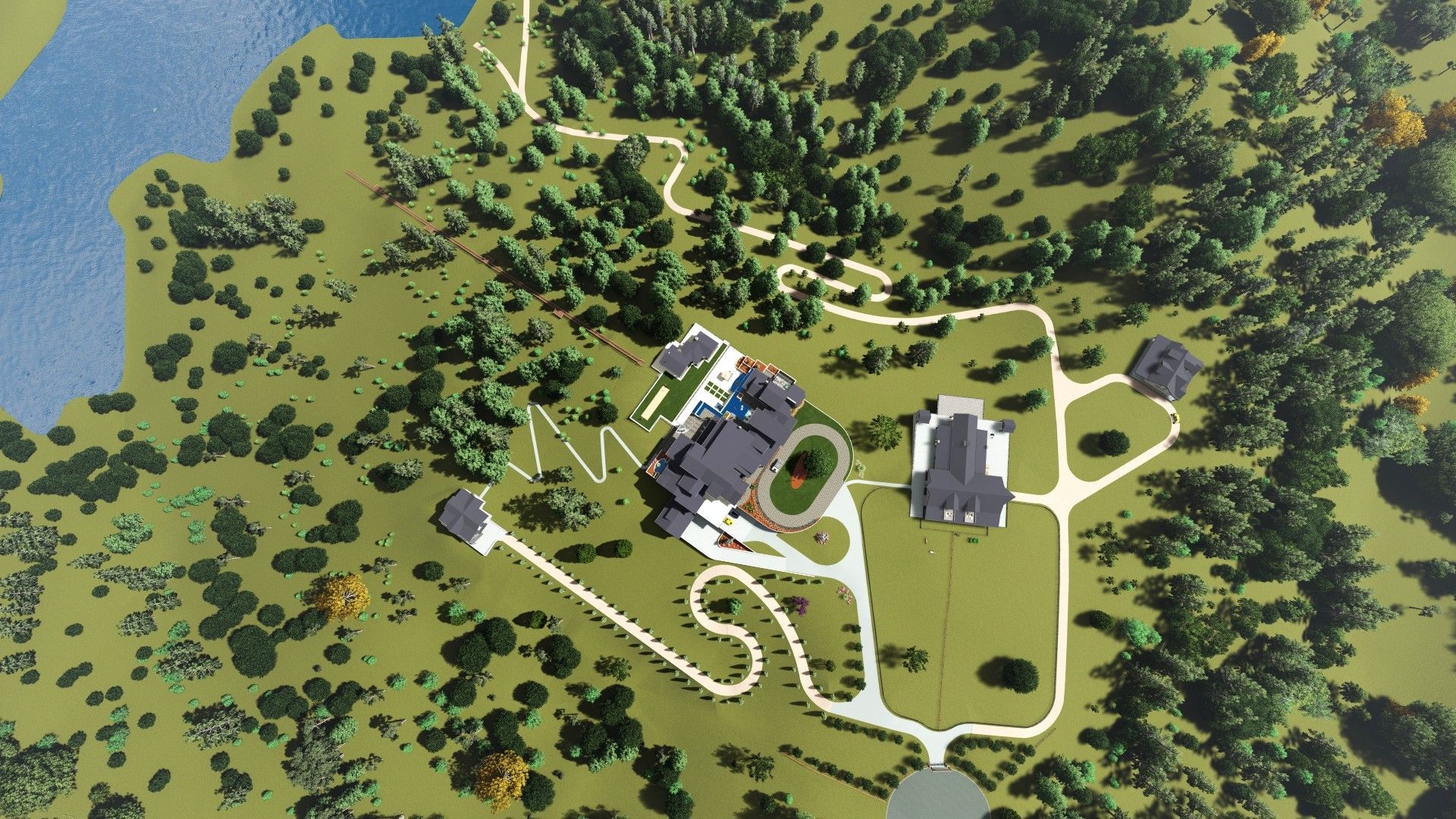 Aerial view of a large estate with buildings, a winding road, trees, and a lake.