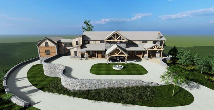 An aerial view of a large house on top of a hill.