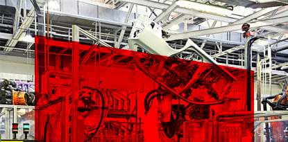 An industrial setting shows a car body being assembled with red overlay.