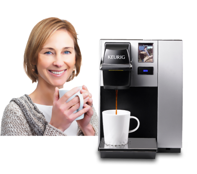 Woman drinking coffee with coffee machine