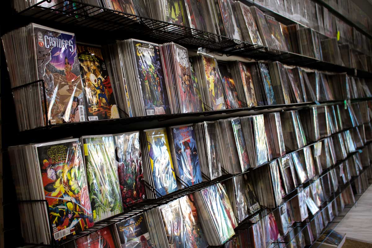 A shelf full of comic books.