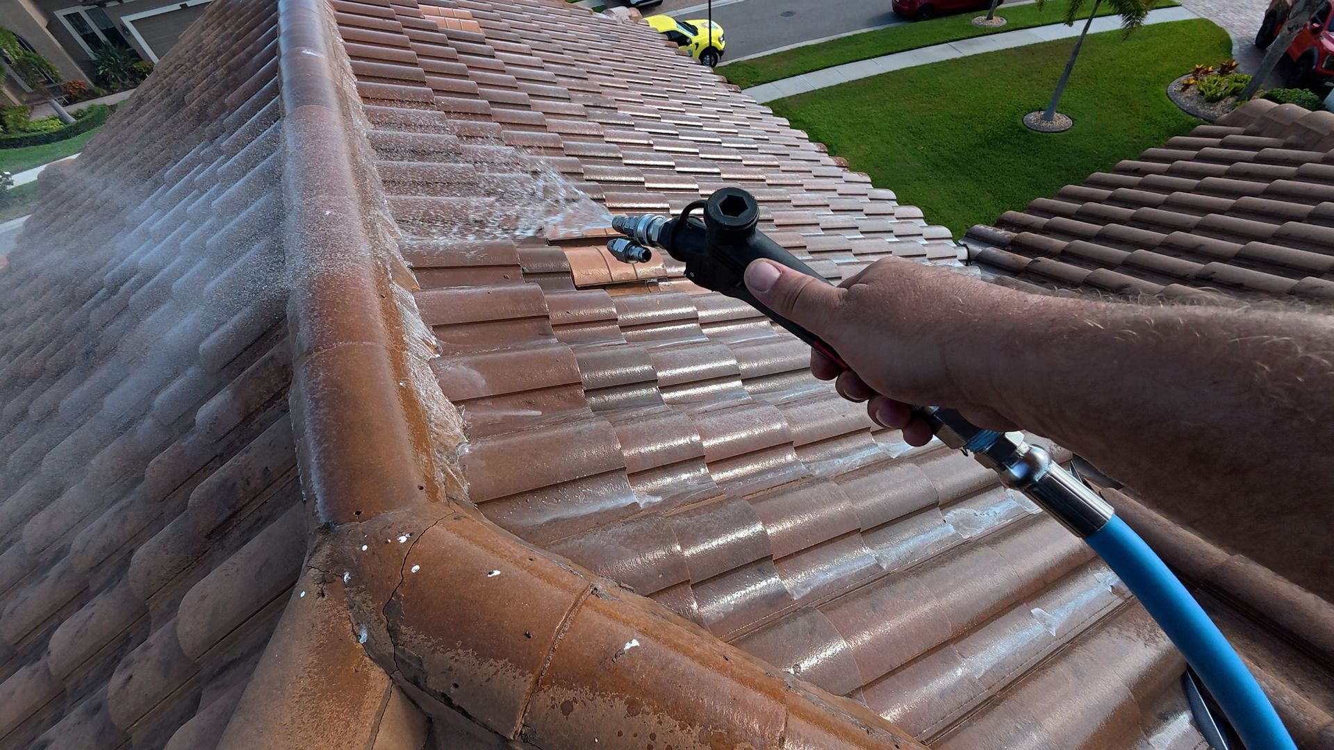Soft washing tile roof