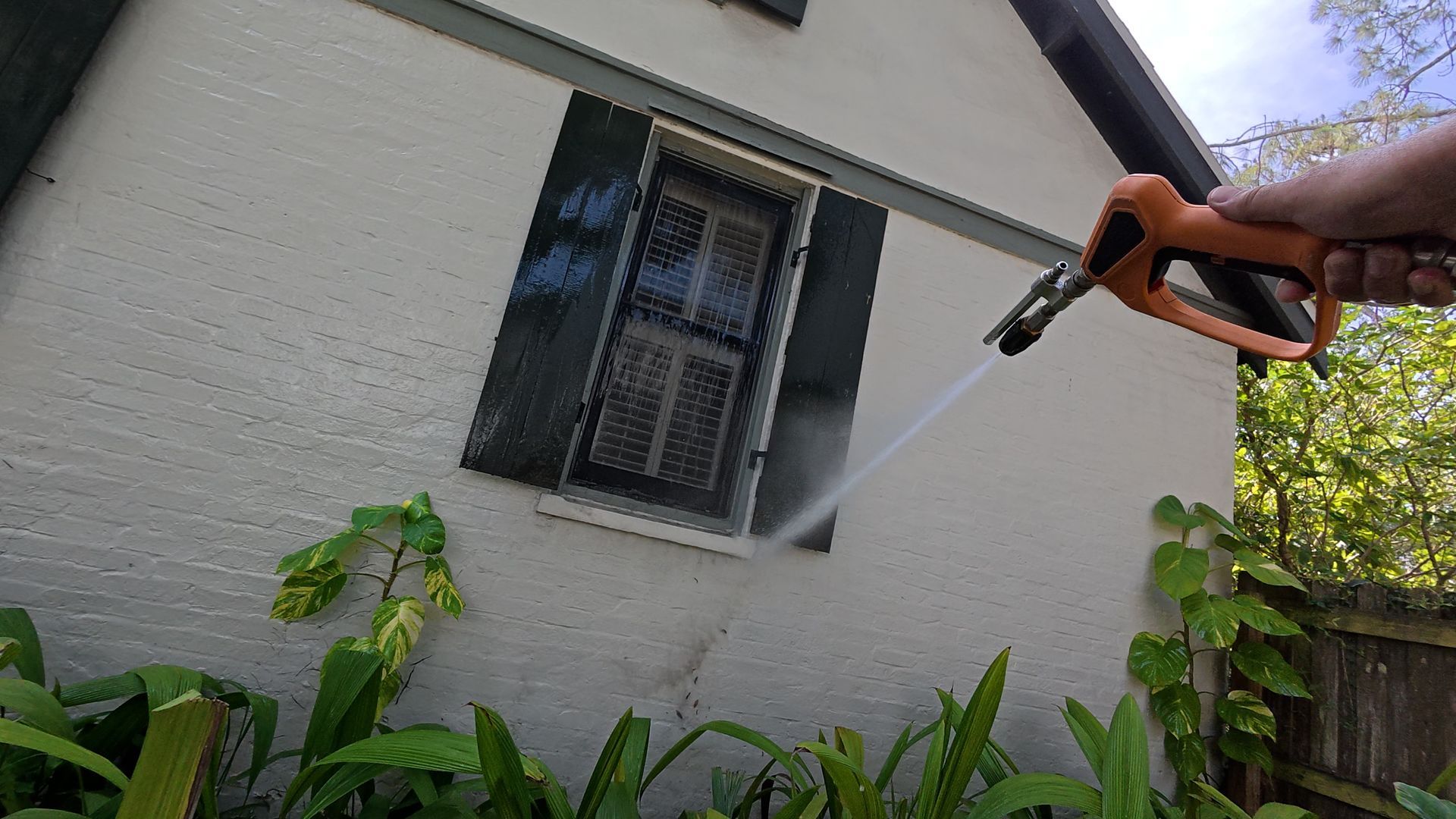 Soft washing a brick house