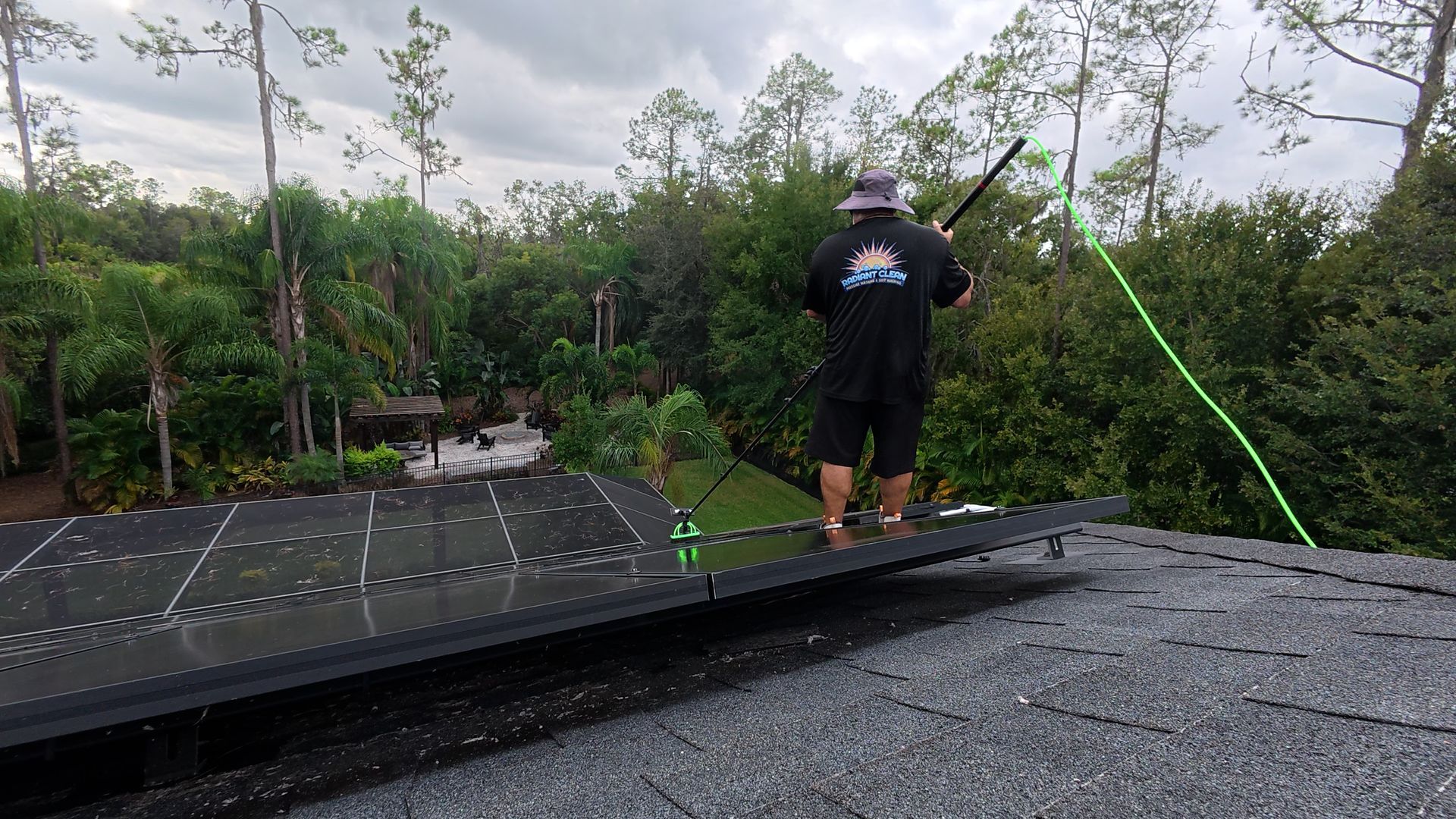 Cleaning solar panels with water fed pole