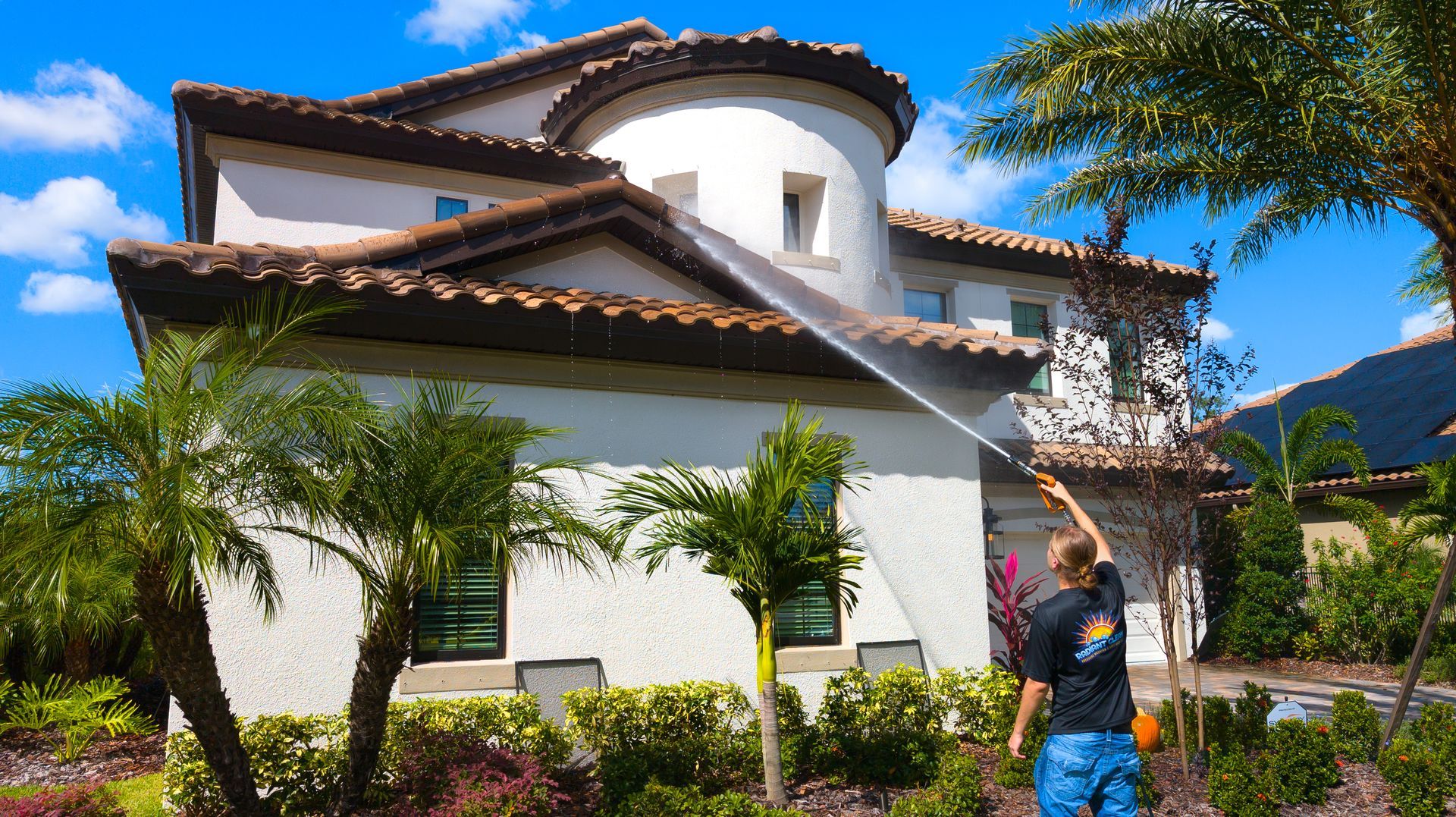 Soft washing a house