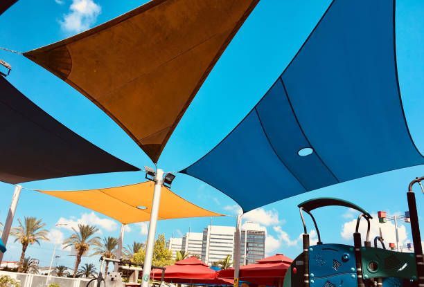 Public children's playground with colourful shade sail