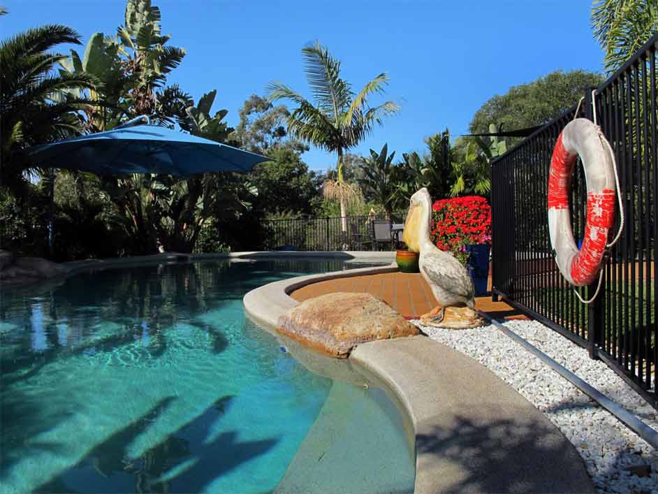 Swimming Pool with Umbrella — Capalaba, Qld — M & M Tarp Repairs