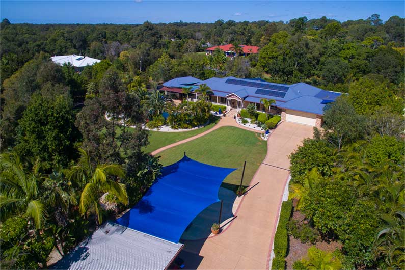 Tarp on Lawn — Capalaba, Qld — M & M Tarp Repairs