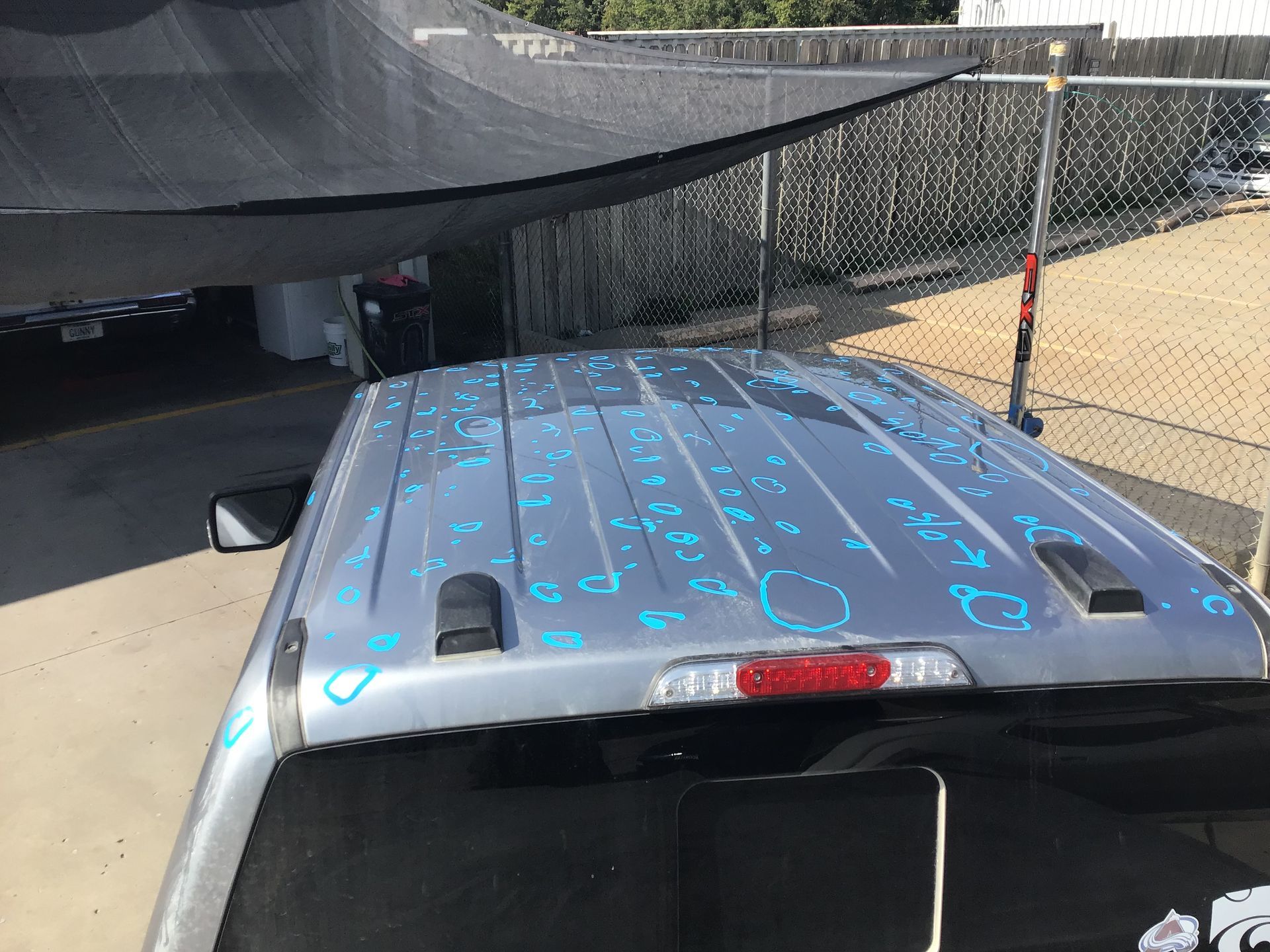 The roof of a silver van has been damaged by hail.